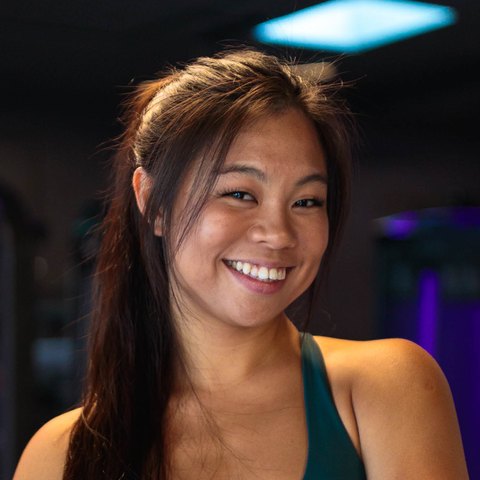 Yu Qian Goh, founder of Goh Motion, smiling in her gym